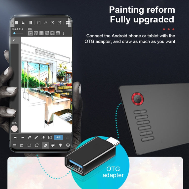 Dark graphics tablet with red control button and OTG adapter cable connection