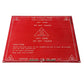 Red rectangular heated bed PCB with warning icons and text around edges