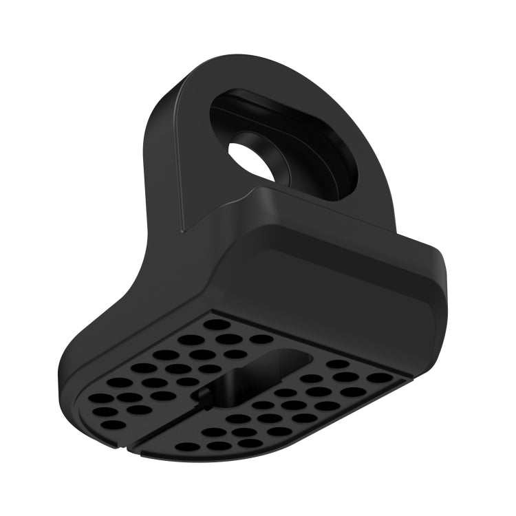 Black silicone charging bracket with perforated charging contact platform and support.