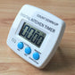 White digital kitchen timer front view with LCD countdown and blue control buttons