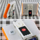 Digital kitchen timer underside with speaker grill and battery compartment cover, plus magnetic backing