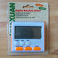 Boxed digital kitchen timer with foldable stand and LCD screen, orange buttons
