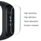 Clear PET screen protector film on fitness tracker screen, close-adhesion fit