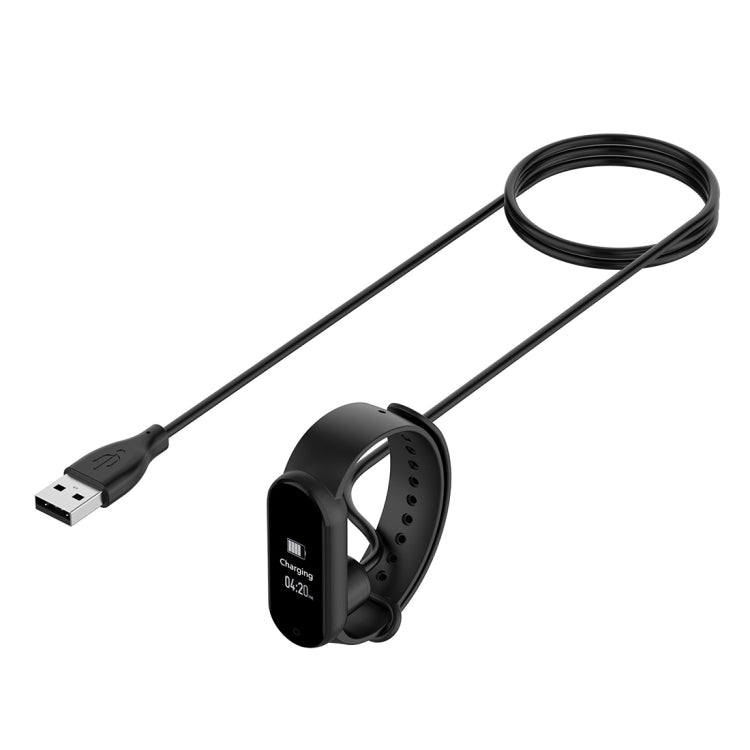 Magnetic charging cradle with black USB cable for wearable band connection
