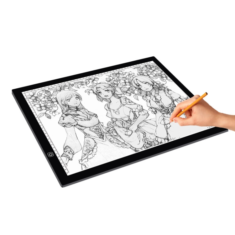 Black LED tracing light pad with anime line drawing and person drawing with orange stylus
