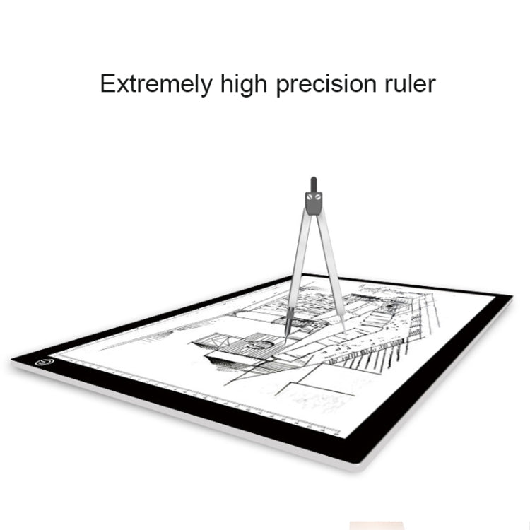 Black LED light pad with ruler overlay and detailed building sketch for tracing