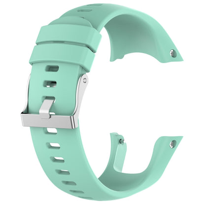 Mint green silicone watch band with metal clasp and punched strap holes.