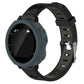Gray silicone protective watch case with cutouts and buttons, on black strap