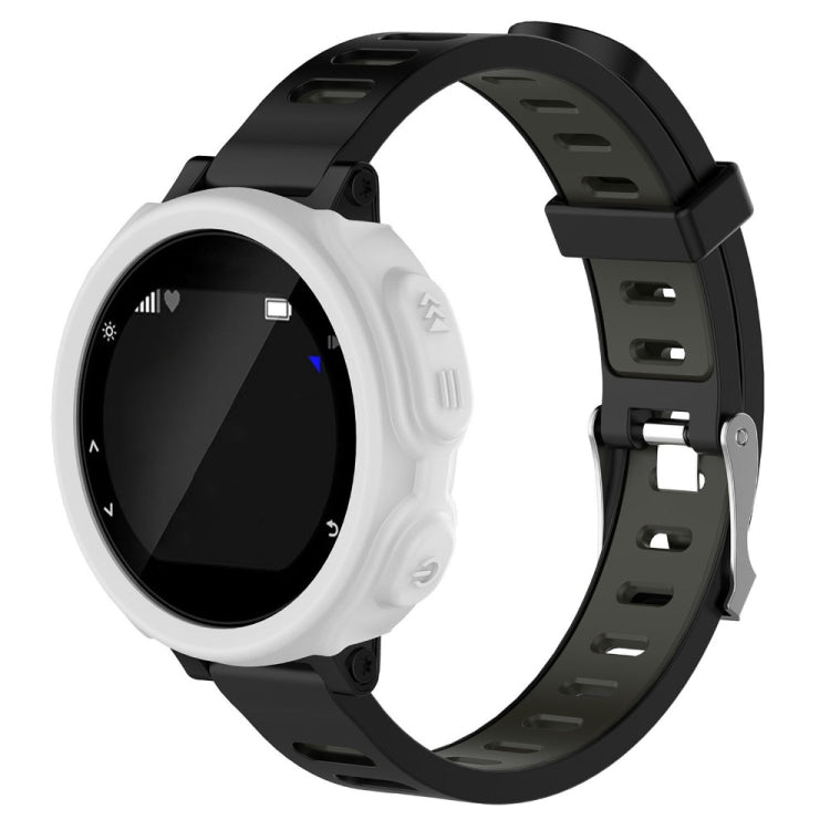 White silicone protective watch case with cutouts and buttons, on black strap