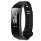 Black silicone watch band with dark display and adjustable clasp for activity tracker