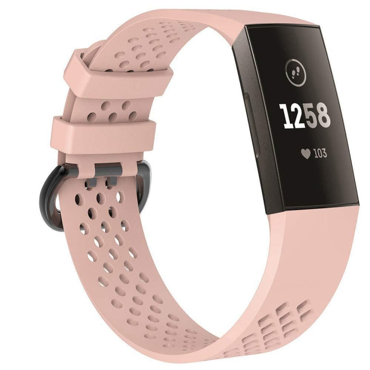 Light pink perforated sport watch band with adjustable strap and textured clasp area.
