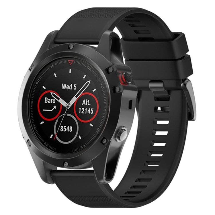 Black 22mm silicone watch band with perforated texture and buckle