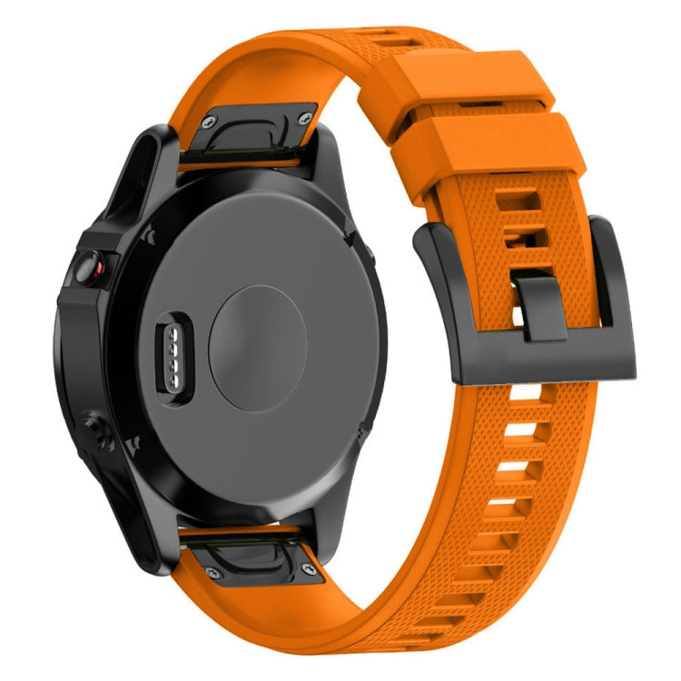 Orange silicone watch band with textured strap and snap clasp, 22mm size