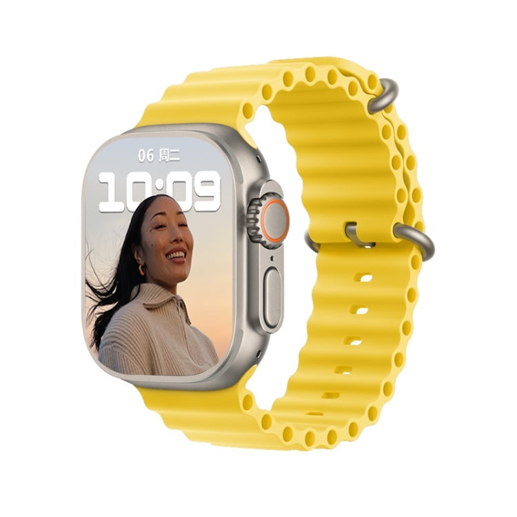 Smartwatch with yellow silicone band, silver case, photo and time shown on screen