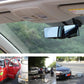 Interior rearview mirror with black frame mounted near the windshield