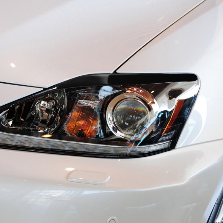 Black ABS headlight light eyebrow installed on front headlamp