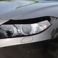 Black light eyebrow trim mounted on front headlamp housing