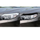 Black light eyebrow trim on front headlamps, two side-by-side views