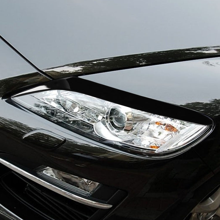 Black glossy headlight light eyebrow trim, fitted over car headlamp