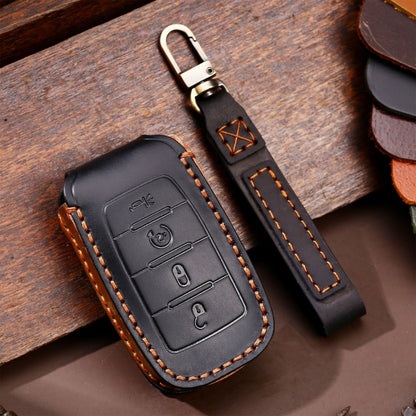 Black leather 4-button key fob protective case with keyring and contrast stitching