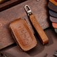 Brown leather 4-button key fob protective case with keyring strap and contrast stitching