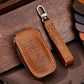 Brown leather key fob protective case with orange stitching and metal key ring, 5-button