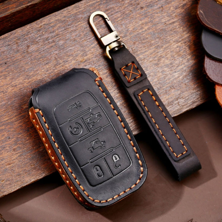 Black leather key fob protective case with stitched border and metal key ring