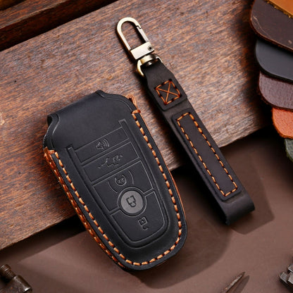 Black leather key fob protective case with stitched edges and metal key ring loop
