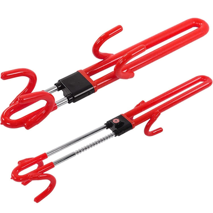 Red steering wheel anti-theft lock with retractable metal rod and black lock housing