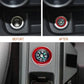 Red cigarette lighter dust cover installed over a circular lighter socket