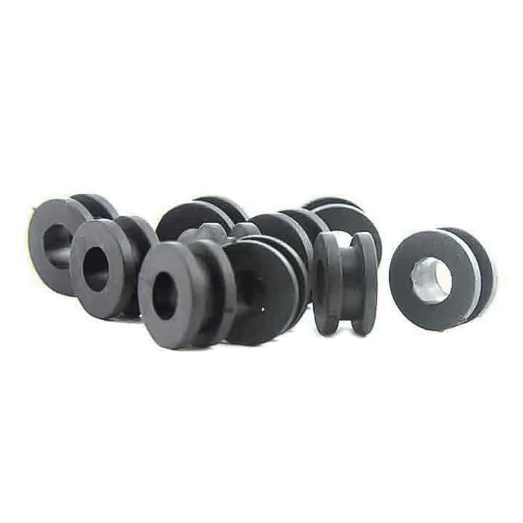 Motorcycle rear shock absorber buffer rings, stacked black rubber with center holes detail