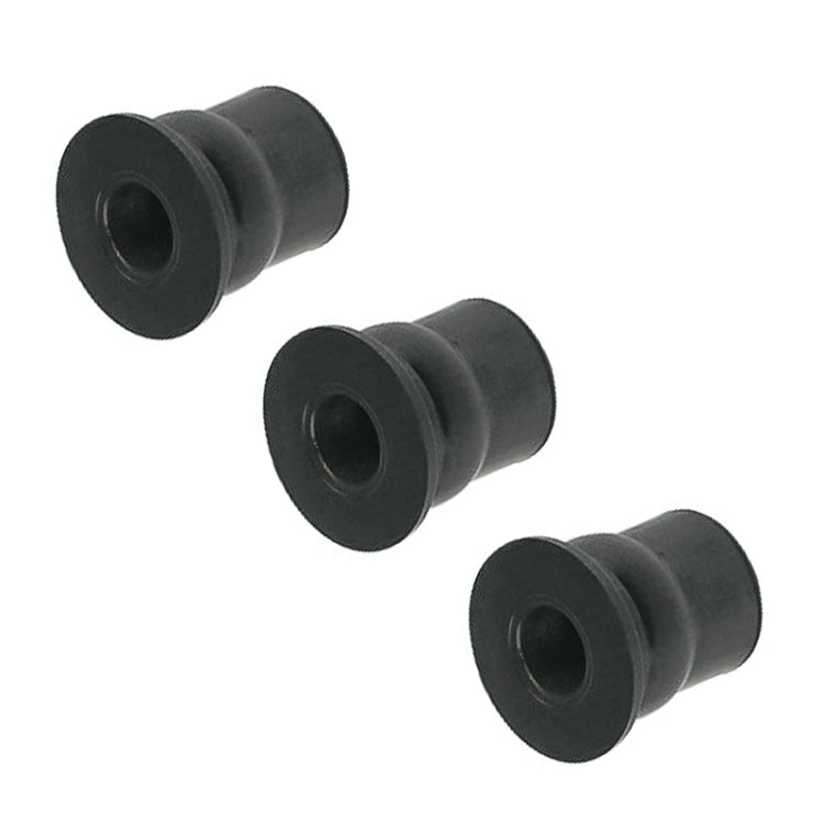 Three black rubber well nuts with open hole ends