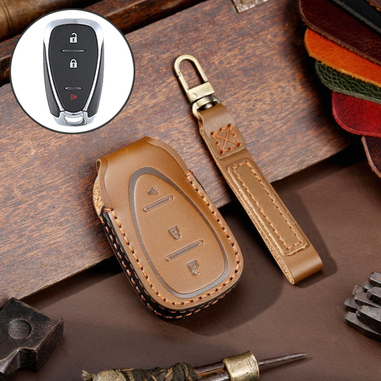 Brown leather key fob cover with stitched edge and key ring loop