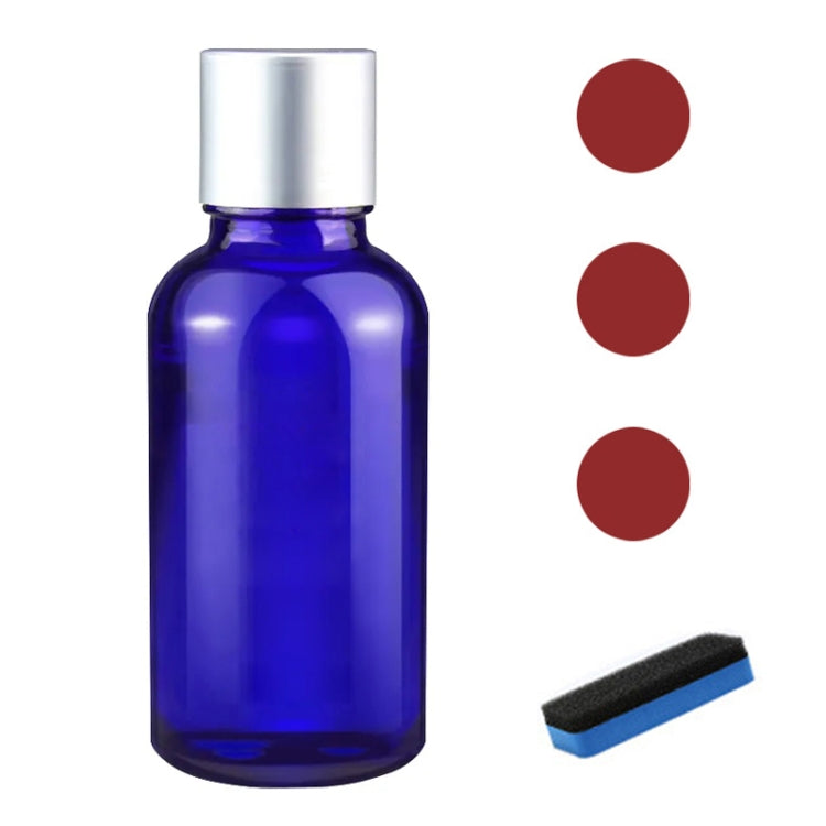 Car headlight repair fluid bottle with blue liquid and silver screw cap