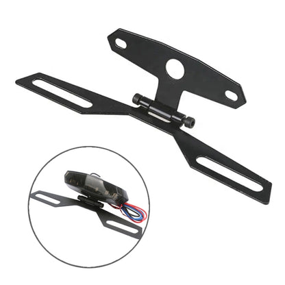 Folding motorcycle taillight bracket in black steel with mounting holes and side slots
