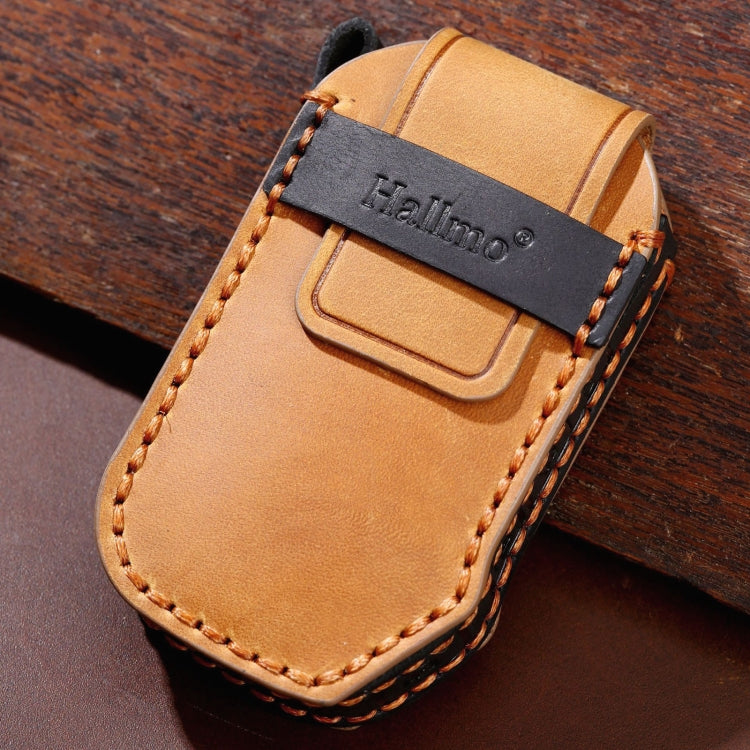 Tan leather key fob cover with black top panel and Hallmo logo patch