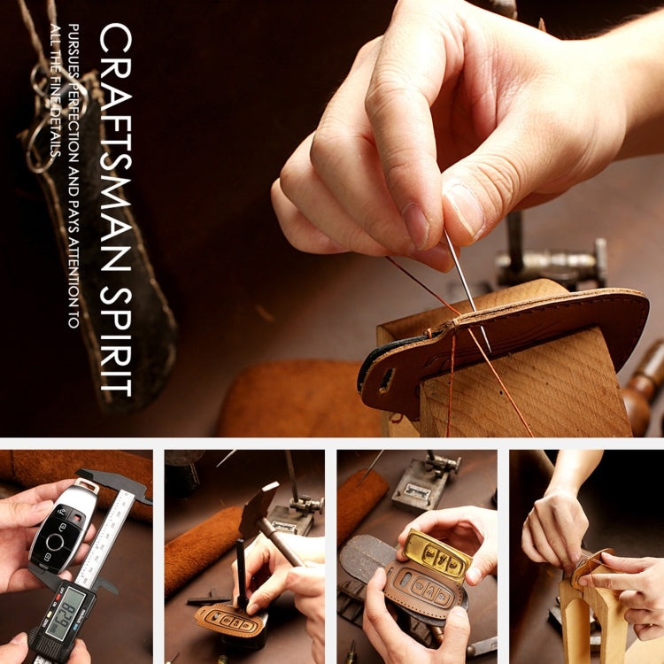 Hand holding leather key fob cover while stitching, orange thread in progress