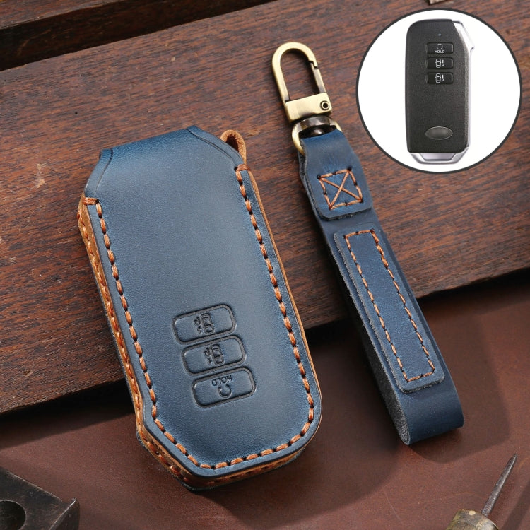 Blue leather key fob cover with metal key ring and orange edge stitching, 3-button style