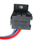 Black automotive relay with printed markings and red, blue, and white wire leads