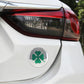 Round car wheel hub decorative sticker with green four-leaf clover on silver
