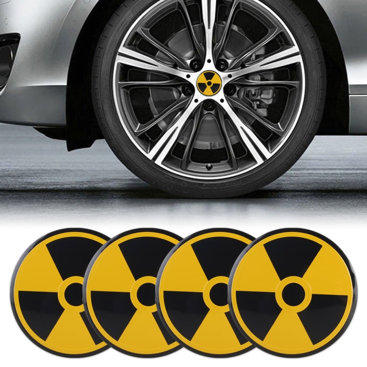 Set of four wheel hub decorative stickers, yellow and black radiation symbol discs
