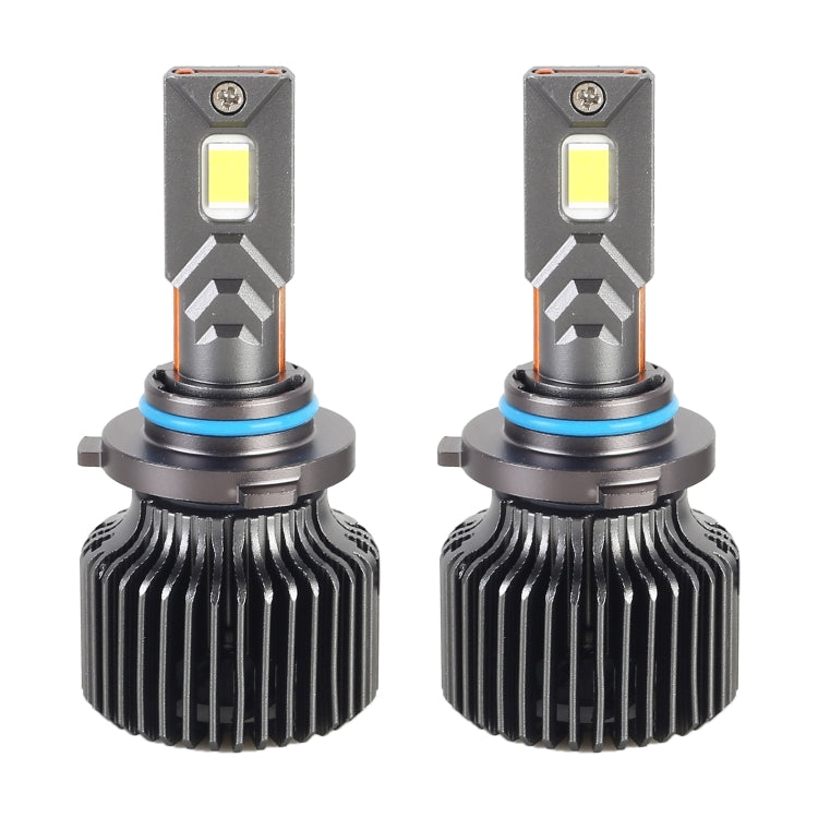 Car LED headlight bulbs close-up: yellow LED chip, ribbed metal housing