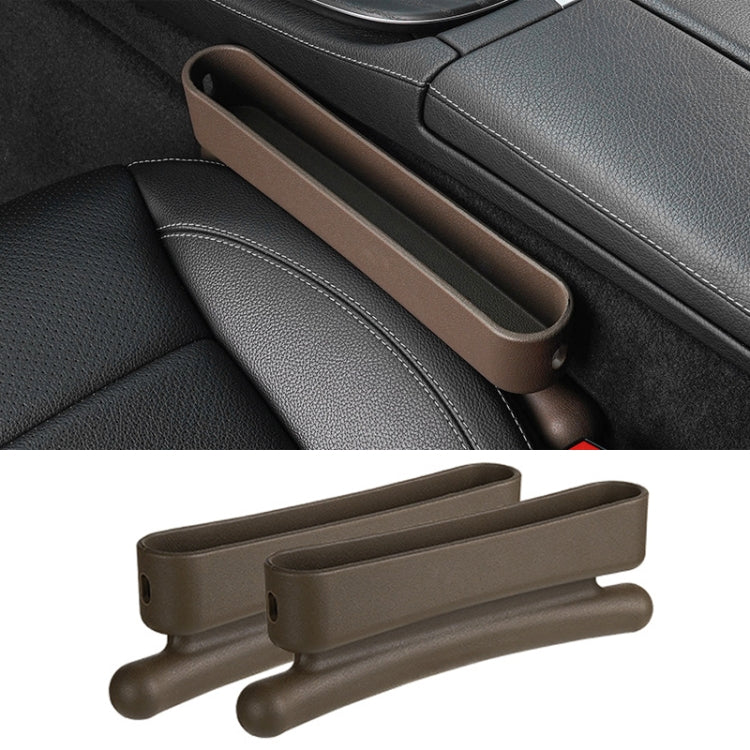Brown car seat crevice storage box pair with two long compartments and rounded end grips