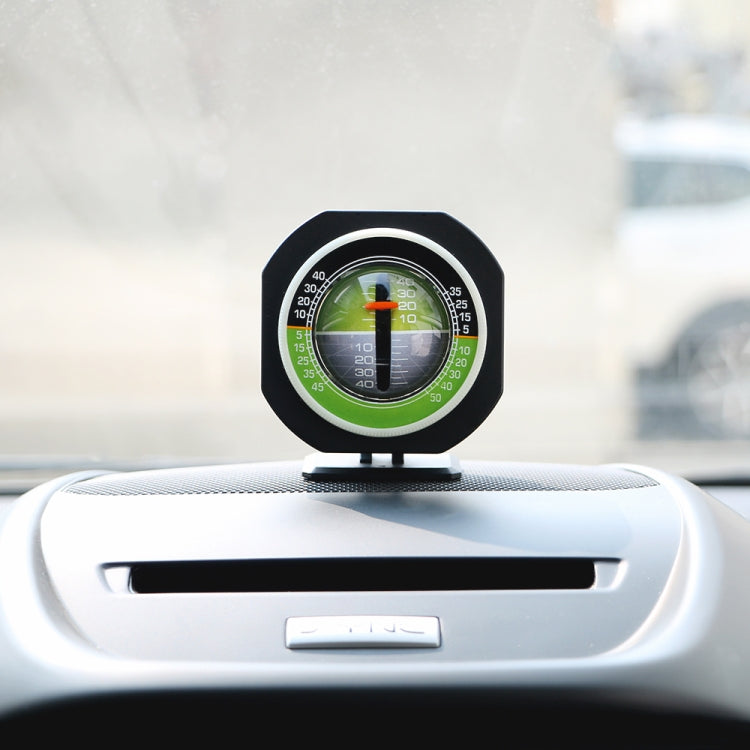 Car dashboard inclinometer level meter with small green LED dial and white light ring