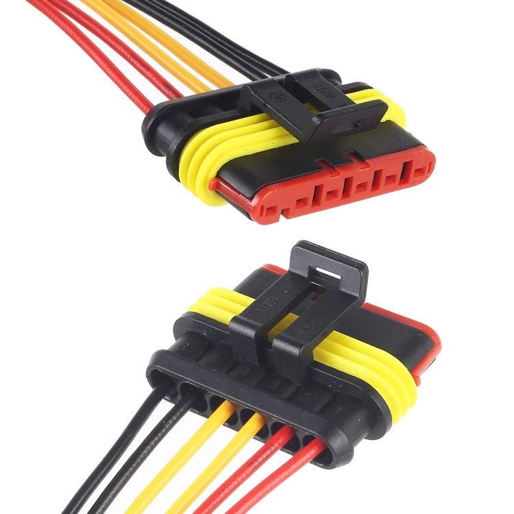 Close-up of car waterproof connector plug with keyed black housing and colored wire leads