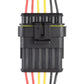 Car waterproof connector plug with black housing and wire leads, top view