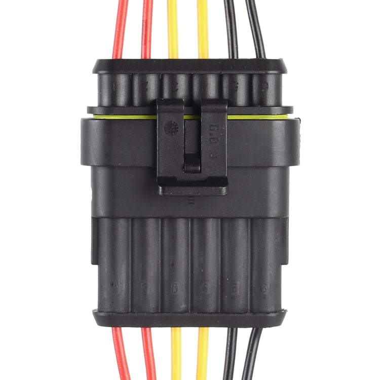 Car waterproof connector plug with black housing and wire leads, top view