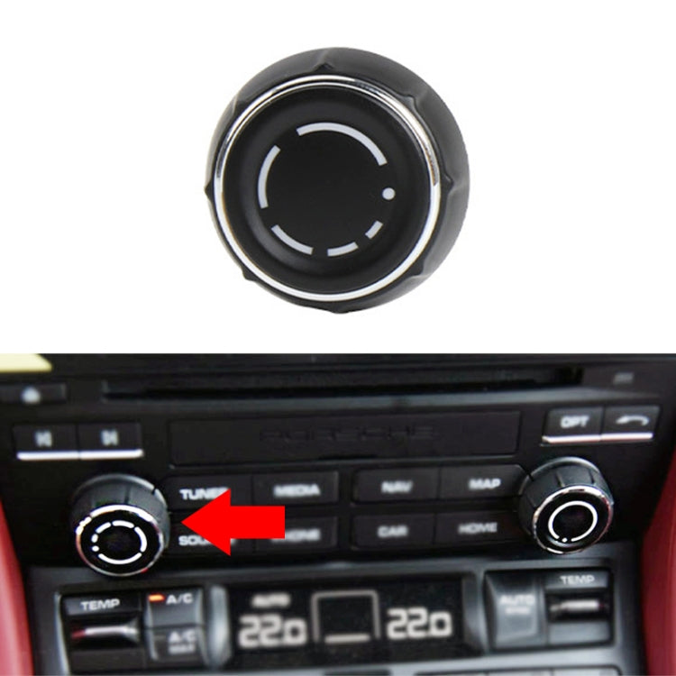 Black round car audio volume knob cover with silver trim ring