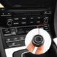 Black audio volume knob cover with silver trim ring held in hand