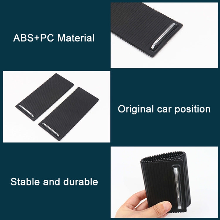 Pair of black ribbed armrest box covers with silver pull handles